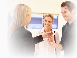 people taking keys to new apartment